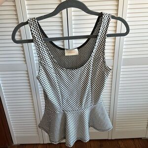 Stretchy white and. Lack polka dot peplum top